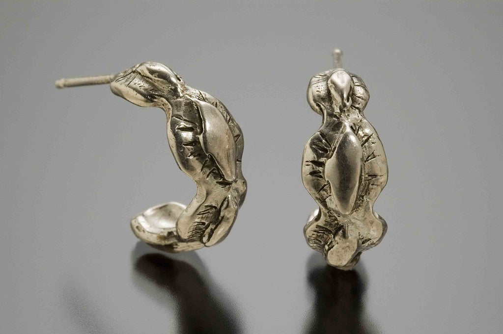 Lacy silver huggy earring