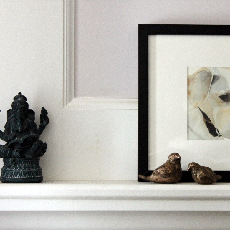 Small bronze bird sculptures