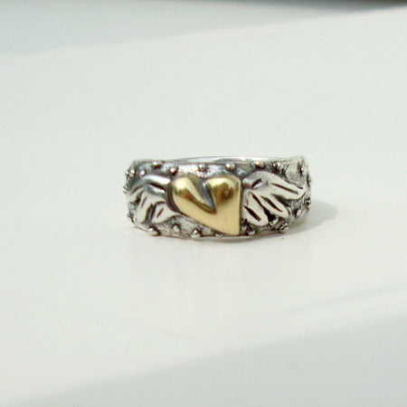te amo ring silver with rose gold flying heart symbol