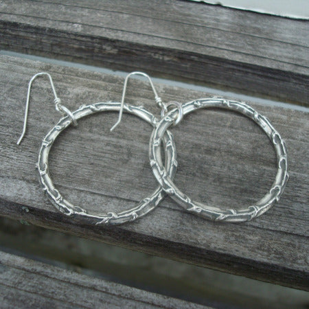 Gorgeously steadfast vine circle earrings...